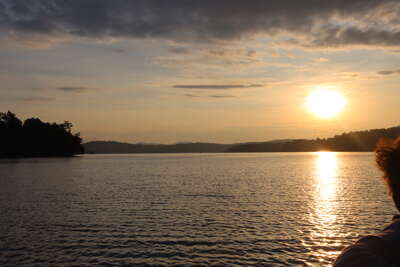 A traveler at a Lake Blue Ridge, GA vacation rental enjoys the...