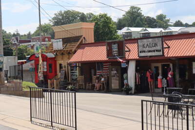 Downtown Blue Ridge, GA lined with various colorful storefronts...