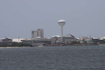 Navarre Beach, FL landscape featuring a mix of residential...