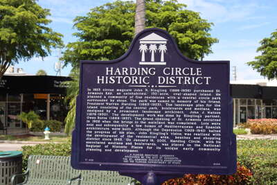 A blue historical marker detailing the Harding Circle Historic...