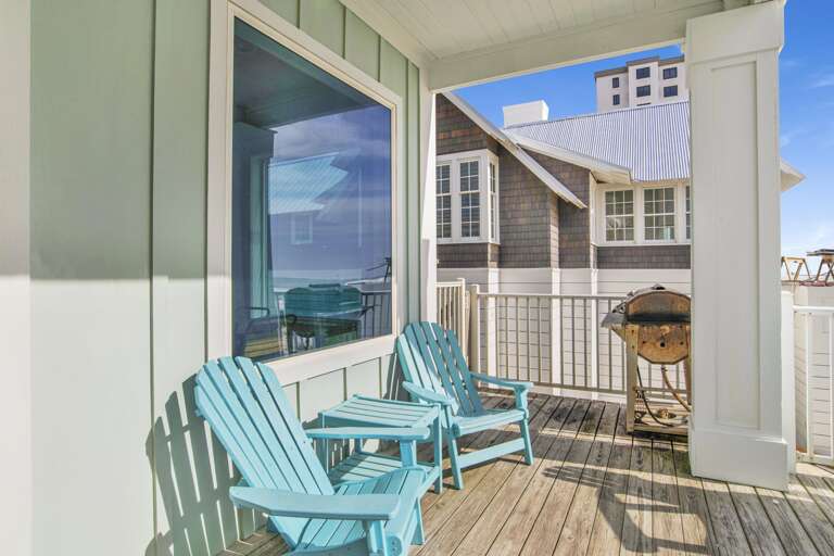 Stainless Gas grill on back deck overlooking the gulf.
