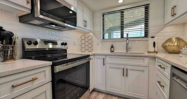 Ocean Trillium 303 (OT303) - New Smyrna Beach - Freshly renovated fully equipped kitchen boasts granite counters - Starter Supplies