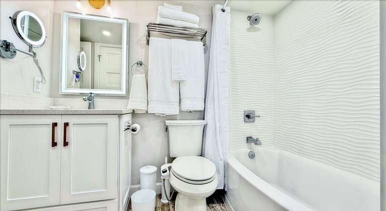 Ocean Trillium 303 (OT303) - New Smyrna Beach - Tub and Shower Combo Bathroom - Bidet on Comfort Height Elongated Toilet - Slow Close Toilet Seat - Lighted Vanity Mirror - Hairdryer - Starter Supplies