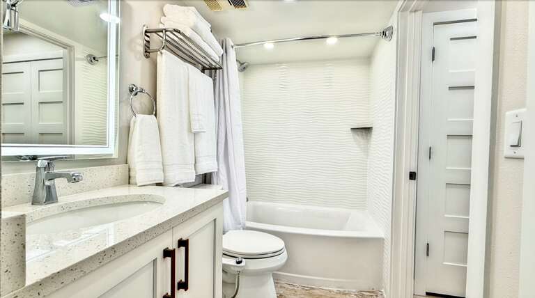 Ocean Trillium 303 (OT303) - New Smyrna Beach - Tub and Shower Combo Bathroom - Bidet on Comfort Height Elongated Toilet - Slow Close Toilet Seat - Lighted Vanity Mirror - Hairdryer - Starter Supplies