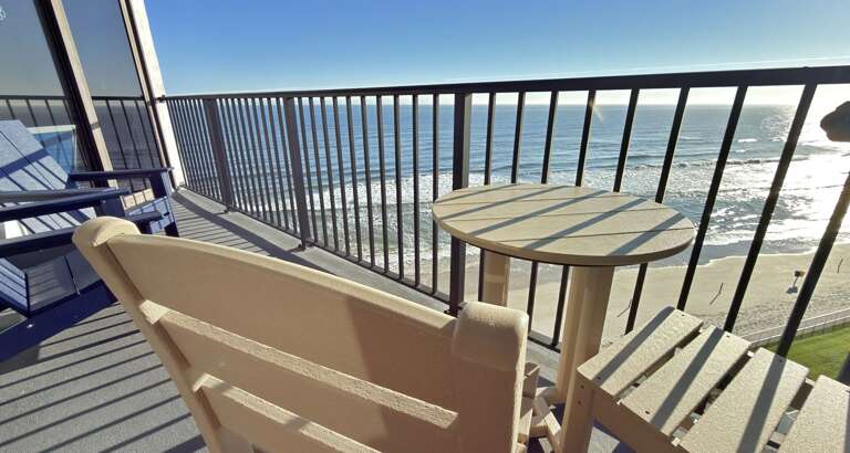 Jeff and Gina Properties - Ocean Trillium 804 the best views in the building bar none! - New Smyrna Beach - 1 BR- 1 BA - Direct Beach Front - Slim Aaron's photography featured design 60's vibe.