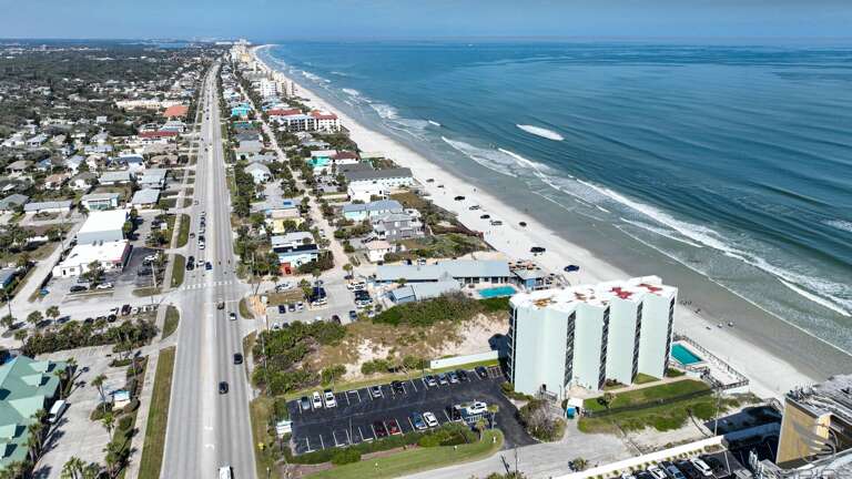 Jeff and Gina Properties - Ocean Trillium 804 the best views in the building bar none! - New Smyrna Beach - 1 BR- 1 BA - Direct Beach Front - Slim Aaron's photography featured design.