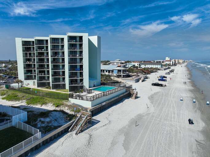 Jeff and Gina Properties - Ocean Trillium 502 - New Smyrna Beach - 1 BR - 1 BA - Beach Views - next door to Chase's on the Beach