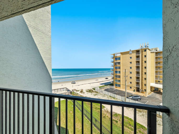 Jeff and Gina Properties - Ocean Trillium 502 - New Smyrna Beach - 1 BR - 1 BA - Beach Views - next door to Chase's on the Beach
