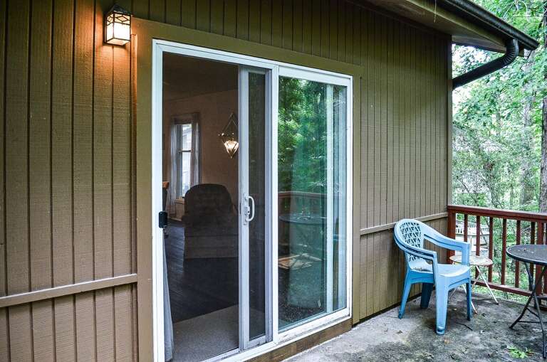 Nestled among lush trees, this private balcony invites you to relax in fresh air with morning coffee or peaceful evenings surrounded by nature.