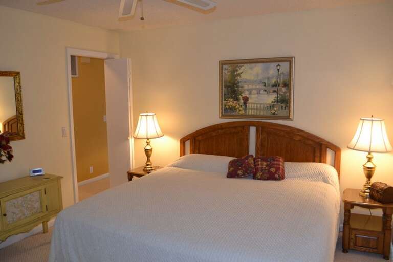 Unwind in your peaceful retreat, where soft lighting and a plush bed create the perfect setting for restful nights and lazy mornings.