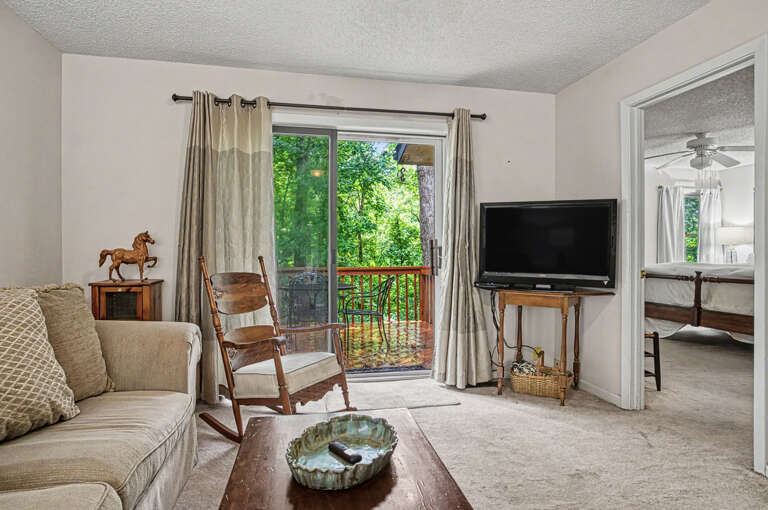 Unwind in your peaceful living room where soft natural light and lush greenery views create your perfect retreat. Step out to your private balcony and breathe in the fresh air.