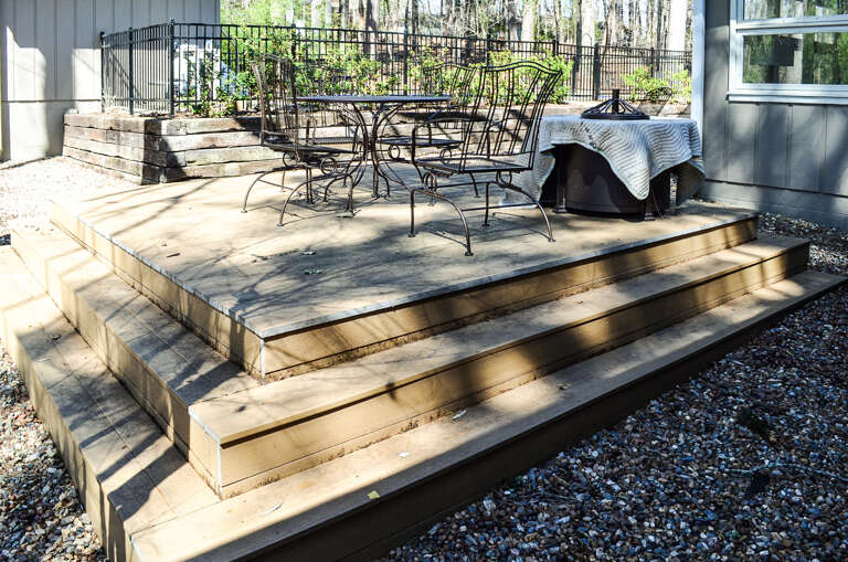 Your private wooden deck awaits with stylish outdoor furniture, perfect for morning coffee or evening relaxation.