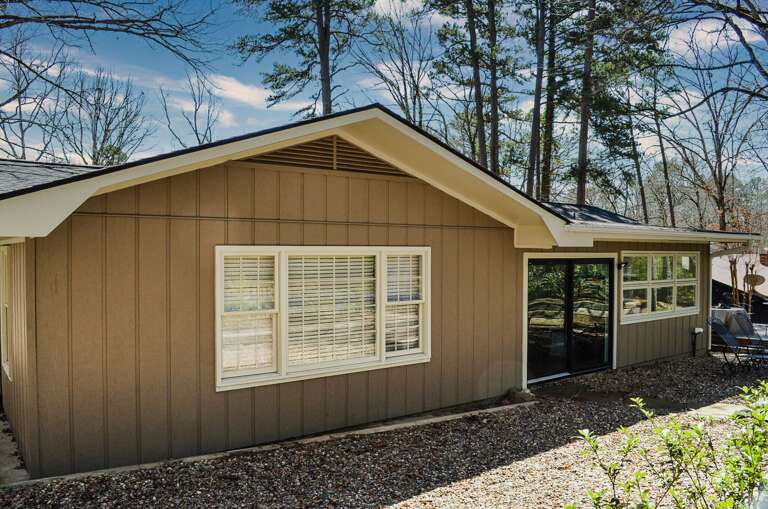 Charming woodland retreat nestled among towering trees offers peaceful seclusion and natural beauty for your getaway.