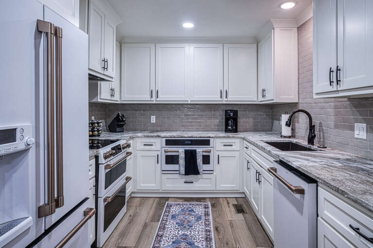 Your fully equipped kitchen features granite counters, stainless appliances, and everything you need to create memorable meals during your stay.