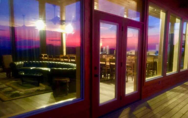 Sunrise Reflections on the Patio Windows