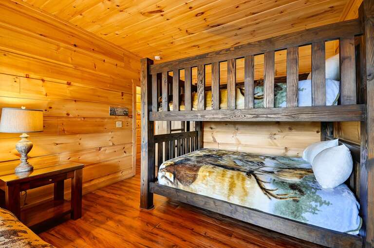 Bedroom Includes One Wooden Bunk Bed. Bedroom Includes One Wooden Bunk Bed.