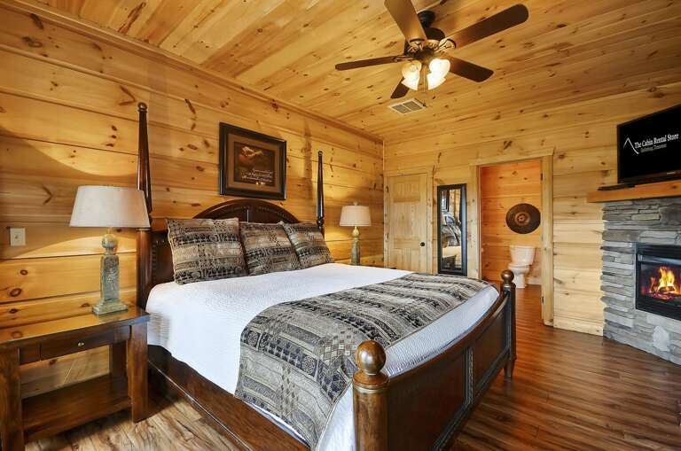 Large Bedroom Includes Fireplace and TV. Large Bedroom Includes Fireplace and TV.