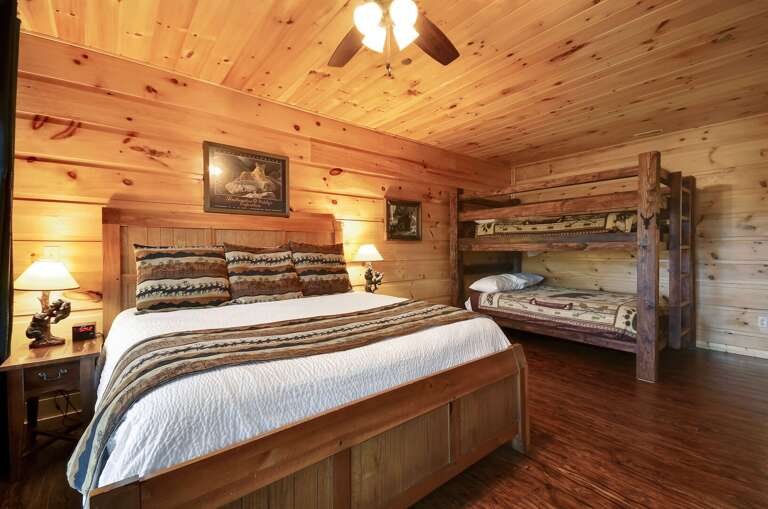 Spacious Bedroom Includes a Large Bed and One Bunk Bed. Spacious Bedroom Includes a Large Bed and One Bunk Bed.