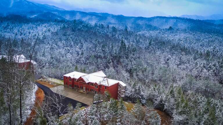 Aerial photo of this Vacation rental near Gatlinburg TN, with the surrounding forest visible.