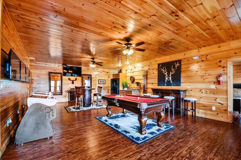 Upper floor game room with mini bar.