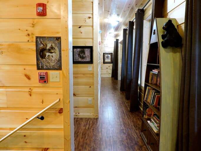Bookcase in the Bedroom and the Stair Rail.