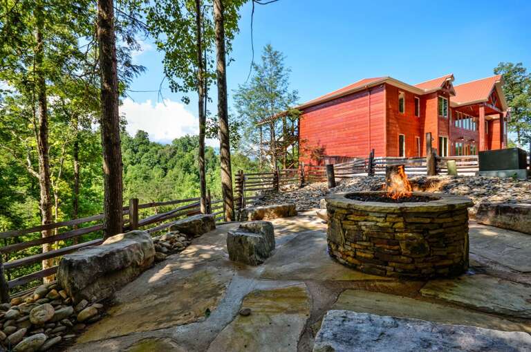 Gathering Area with Fire Pit and Rock Garden Benches.