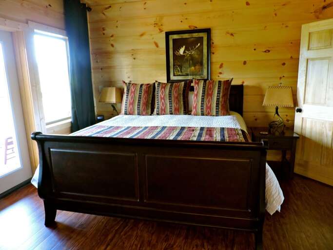 Large Bed, Nightstands, and Table Lamps.