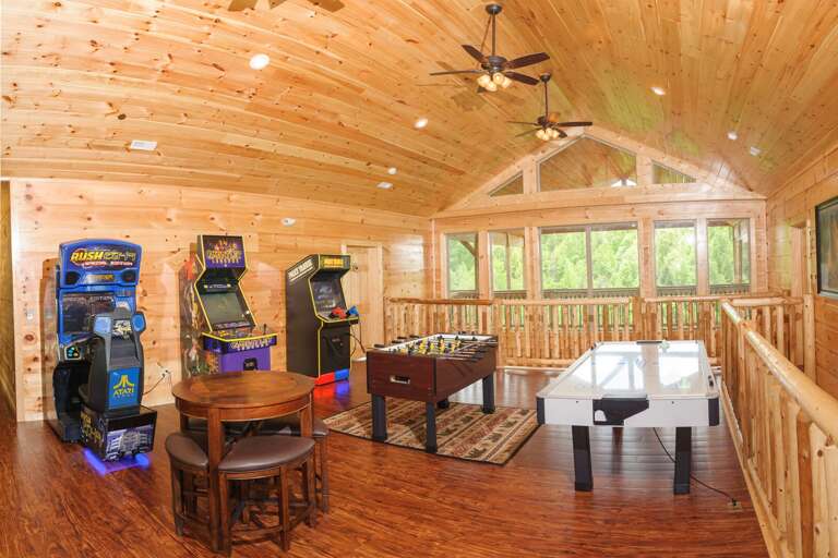 Game Room Includes Arcade Games and Pool Table. Game Room Includes Arcade Games and Pool Table.