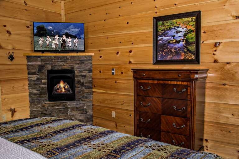 Image of Fireplace and Wooden Dresser. Image of Fireplace and Wooden Dresser.