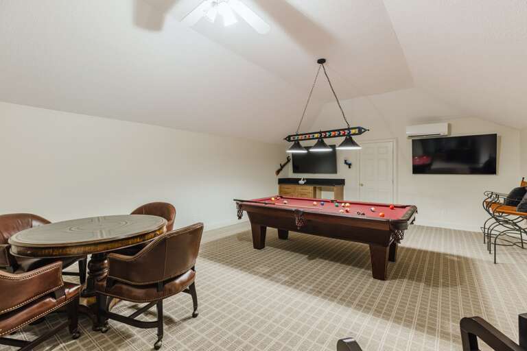 Game Room with Pool Table 
Poker Table 2 TVs and Mega Quest with Gaim hunting game