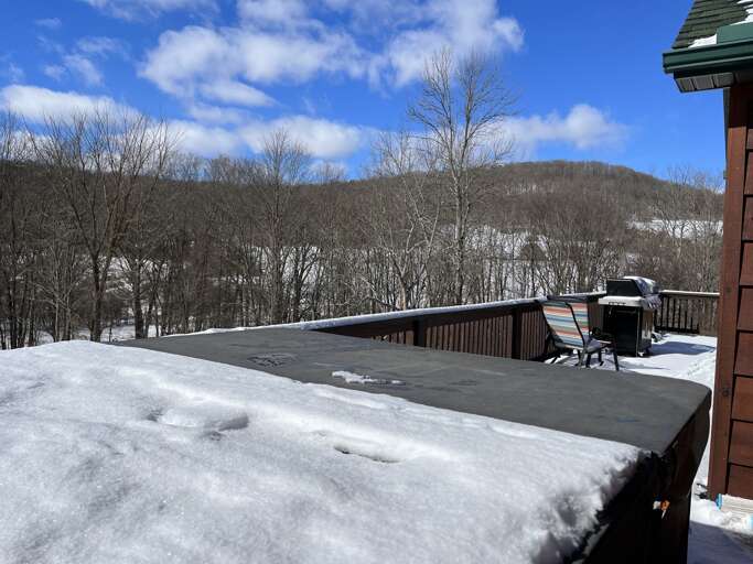 Hot tub on deck  with long range views of surrounding hills
