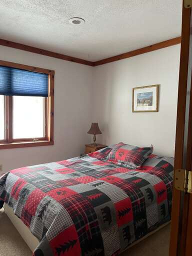 Queen bed second floor bedroom