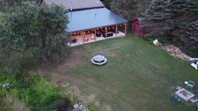 Incredible yard with creek flowing along back of property