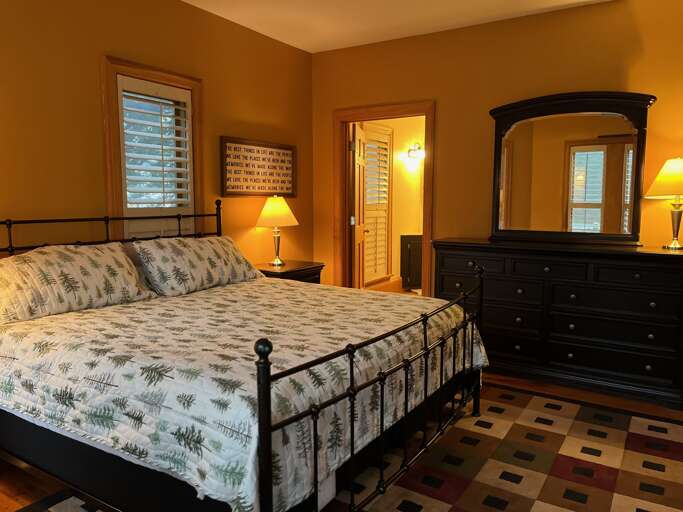 King bedroom large dresser with mirror  and master bath