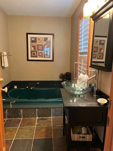 Full bathroom on first level with soaking tub