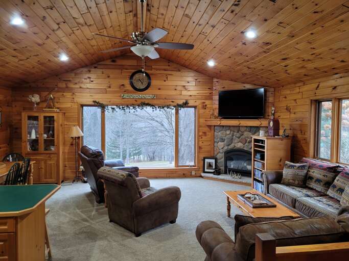 Wonderful gas fireplace with views in this spacious living space Wonderful gas fireplace with views in this spacious living space