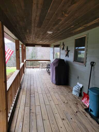 Wonderful covered deck with gas connected  grill  for guests to enjoy grilling Wonderful covered deck with gas connected  grill  for guests to enjoy grilling