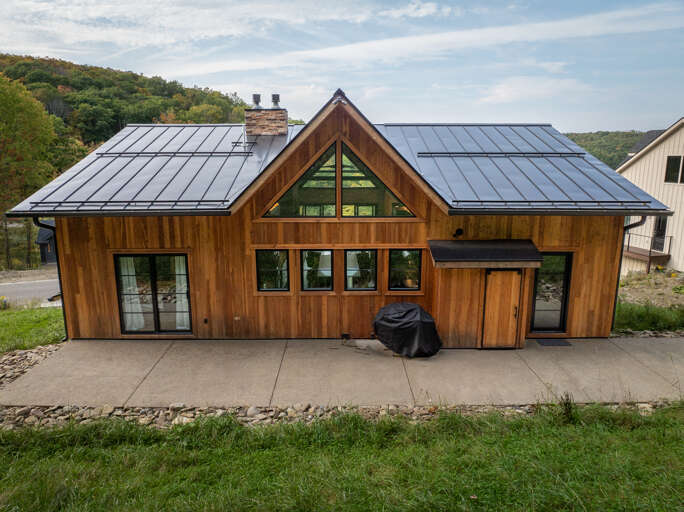 Wonderful concrete back patio with BBQ Wonderful concrete back patio with BBQ