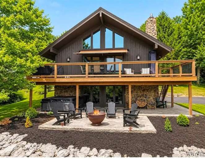 Hot tub and Firepit with views of holimont