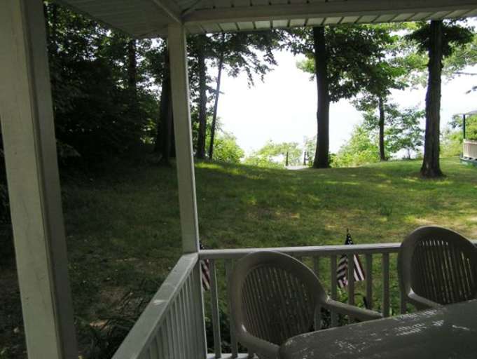 View from Wrap around Porch to Lake Erie and Beach down private stairs