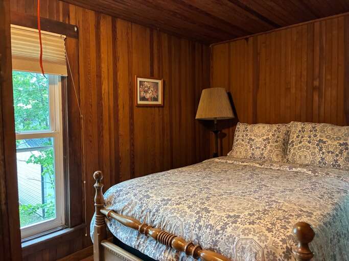 queen bed with lake view