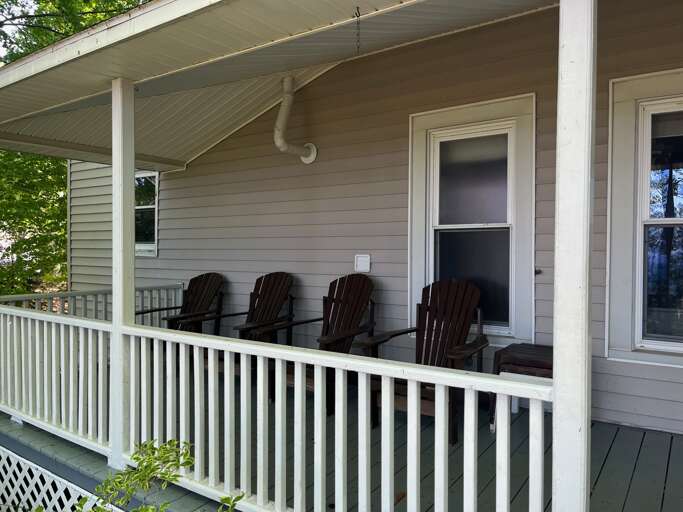 Set of 4 Adirondack Chairs looking out over the lake