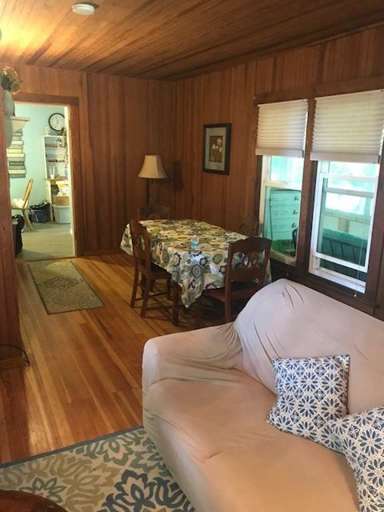 VIEW FROM LIVING ROOM TOWARD DINING AREA AND KITCHEN