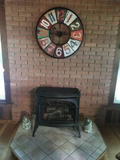 LIVING ROOM SHOT WITH VERMONT STOVE