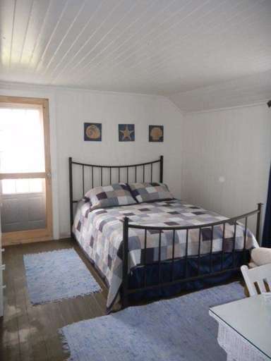 Bedroom Two - Queen Bed and Walk out to Upper Deck - Angola on the Lake Beach House