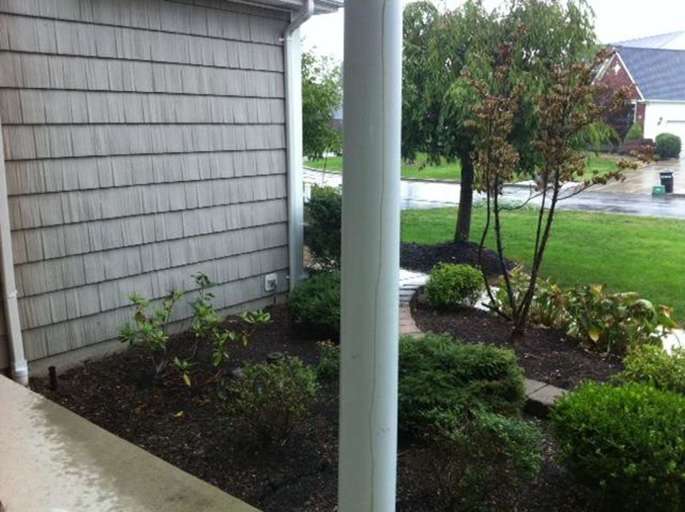 Rainy Suburban House Exterior With Garden Rainy Suburban House Exterior With Garden