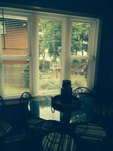 Sun Porch with Sitting, Eating Area and View of the Lake