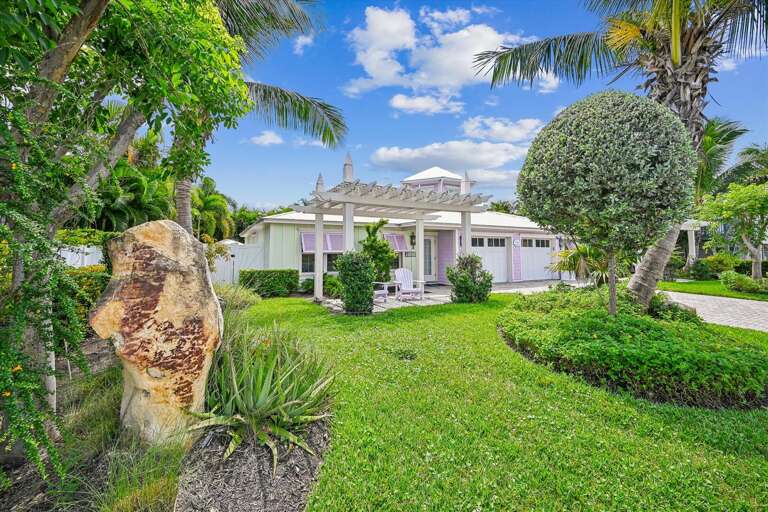 Palm-lined Pathways To Pristine White Vacation Rental