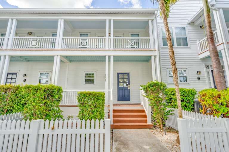 Canal-front home in Marathon FL with a community saltwater pool and family-friendly amenities, offering safe outdoor spaces and easy access to boating and water activities.