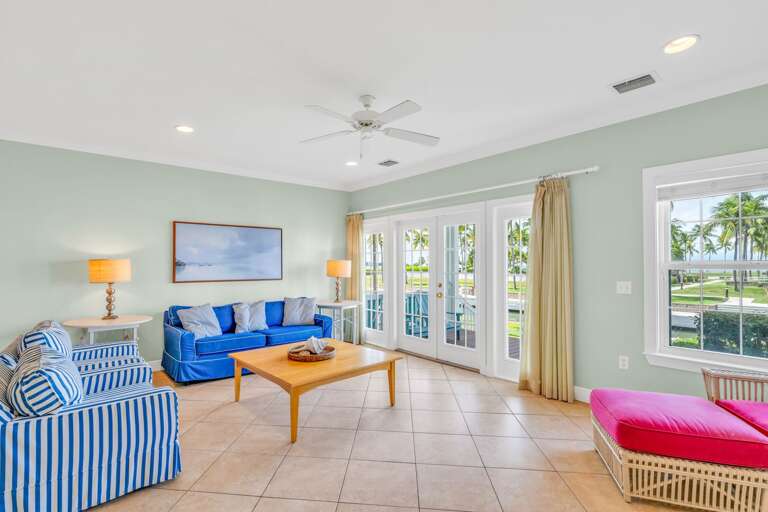 Comfortable yet upscale living space in a Marathon FL canal-front vacation rental with access to canal, pool, and outdoor entertaining areas.